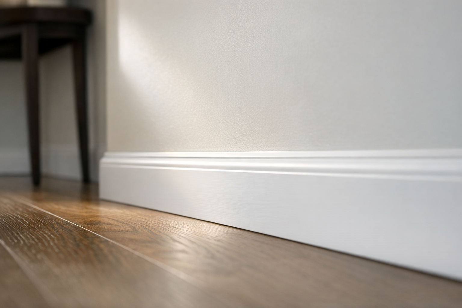 Baseboard upgrade in compact foyer